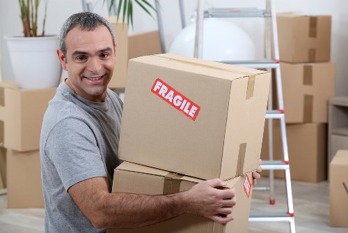 Man and van moving household boxes in Morden Park