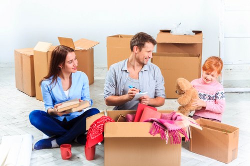 Removal van and moving team preparing a home move in Morden Park