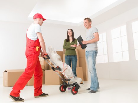 Packaged boxes and furniture ready for transport during a move